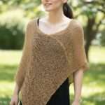 Poncho elegant auriu– rafinament și strălucire subtilă